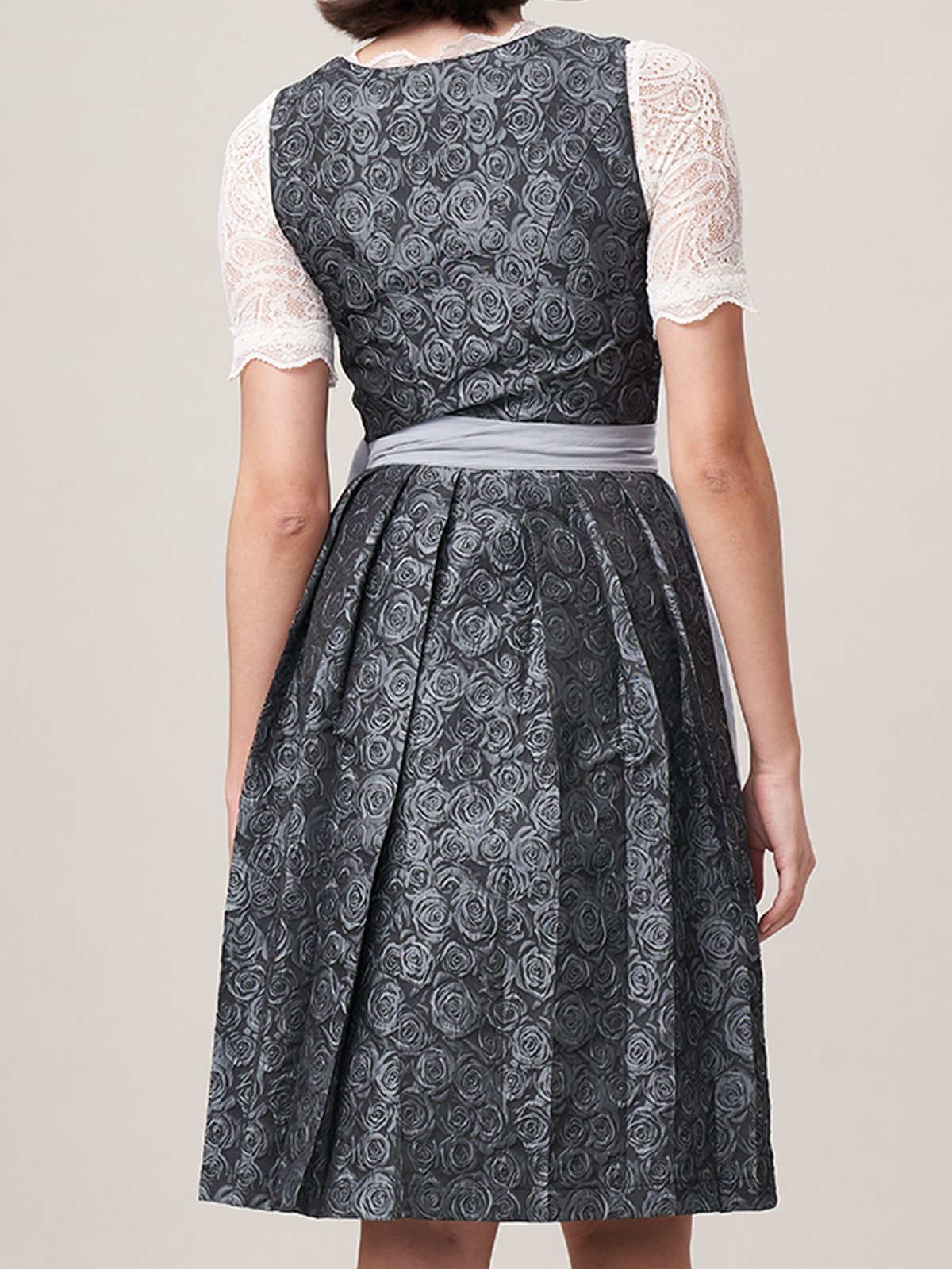 Modernes blaues Dirndl mit figurbetonendem Schnitt